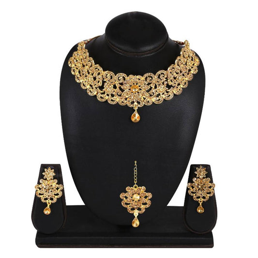 Gold Choker with earrings and maang tika