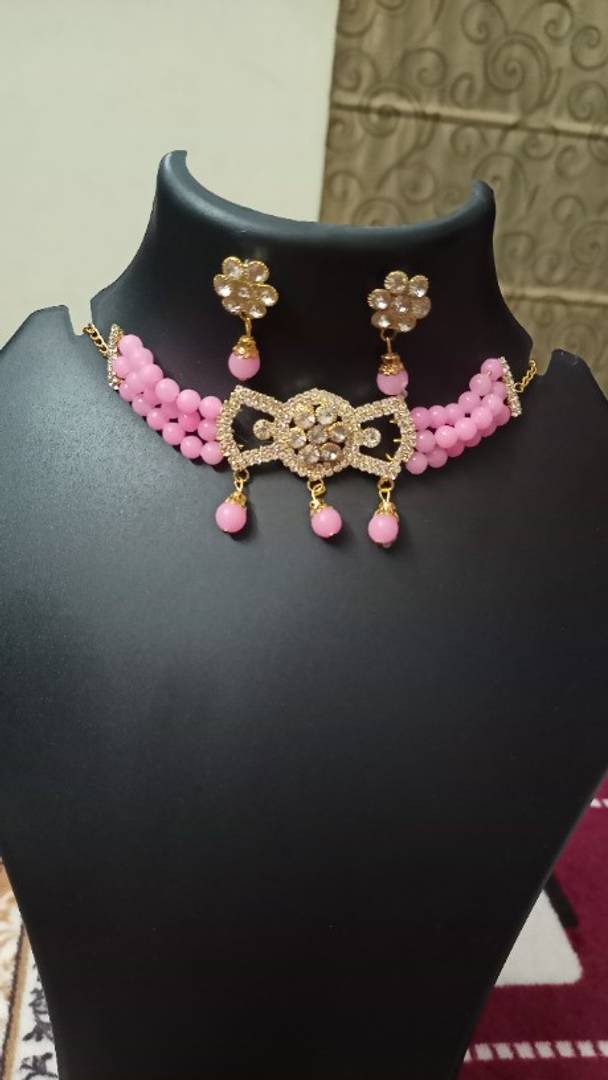 Pink necklace with earrings