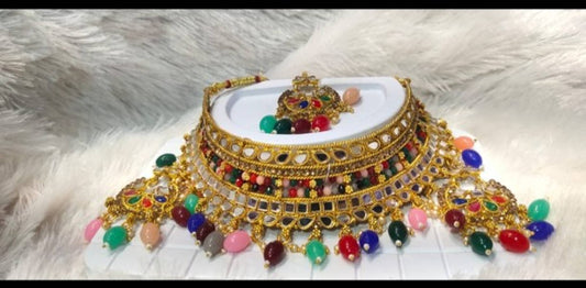 Latest jewellery set with earrings And Maagtika