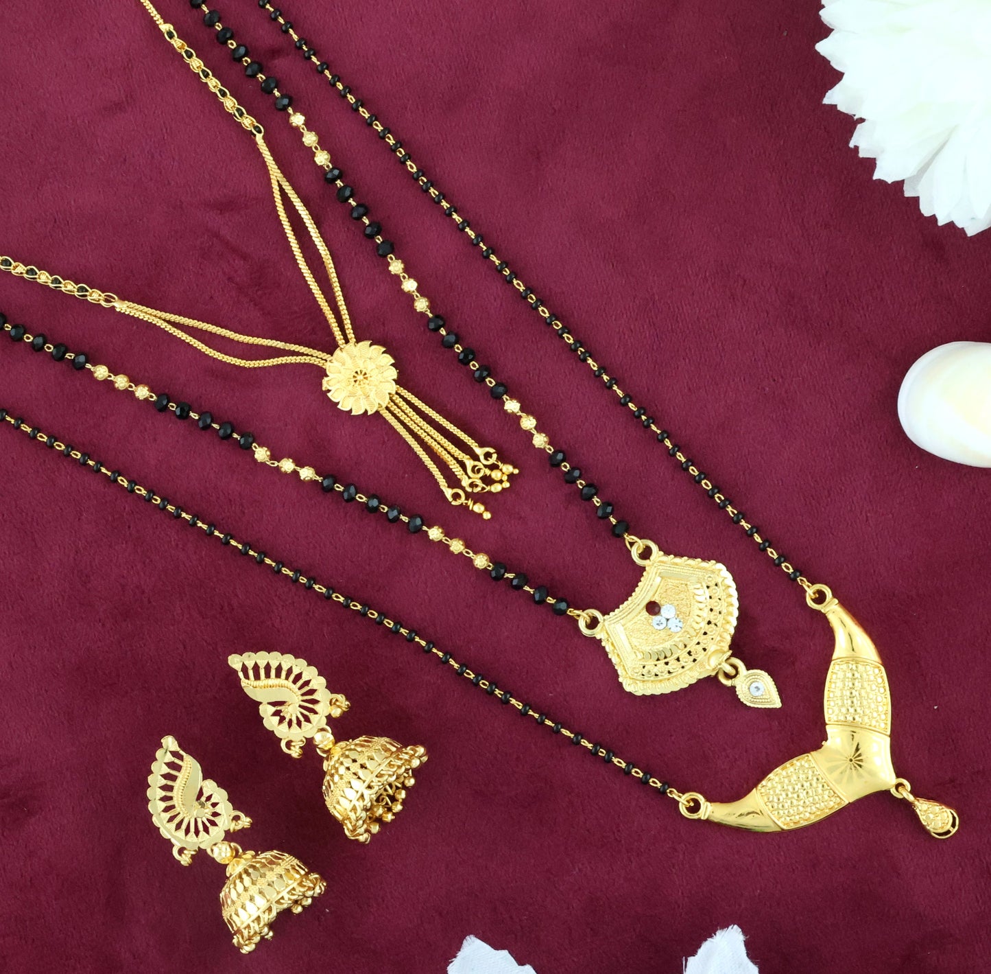 Mekkna Women's Pride Traditional Alloy Gold Plated Combo of Mangalsutra with Earrings | Buy This Combo set Online from Mekkna