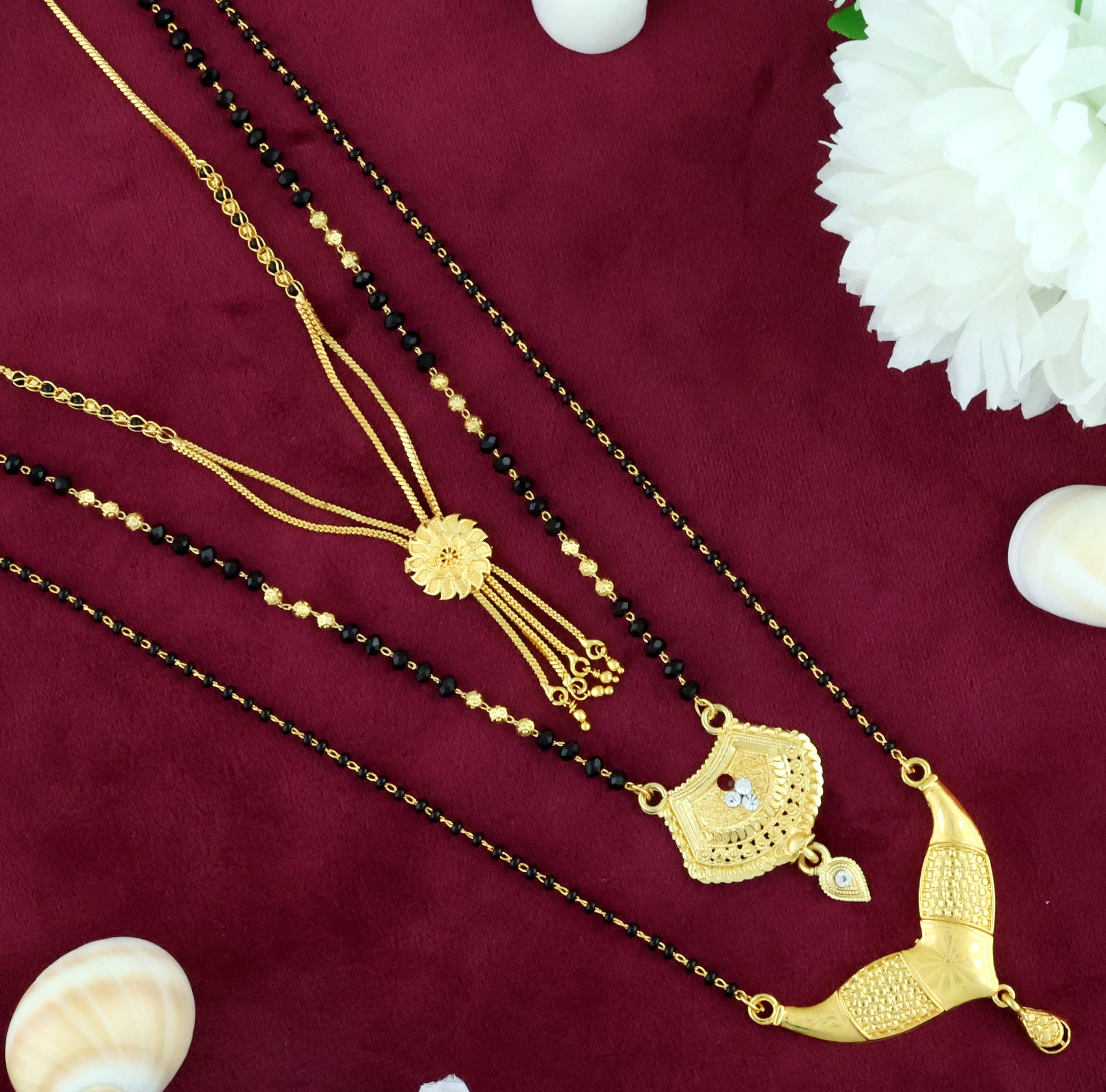 Mekkna Women's Pride Traditional Gold Plated Combo of  Mangalsutra with Earrings for Women. This Jewellery can be used in Special Occasion like Wedding, Engagements etc. This Necklace can be used in daily life also. Buy This Combo set of Mangalsutra Online from Mekkna.